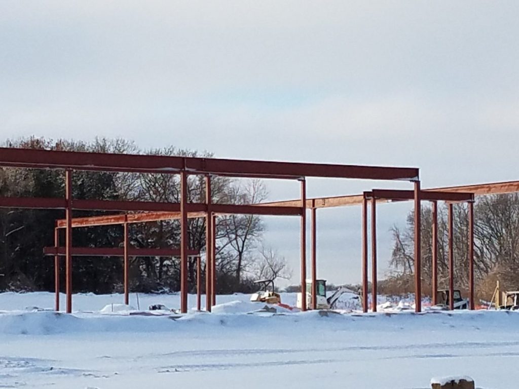 Frame of building in snow